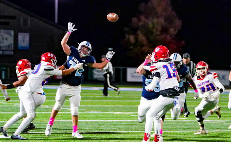 Watauga dispatches Freedom, 49-14, on Senior Night to guarantee a share of NWC title