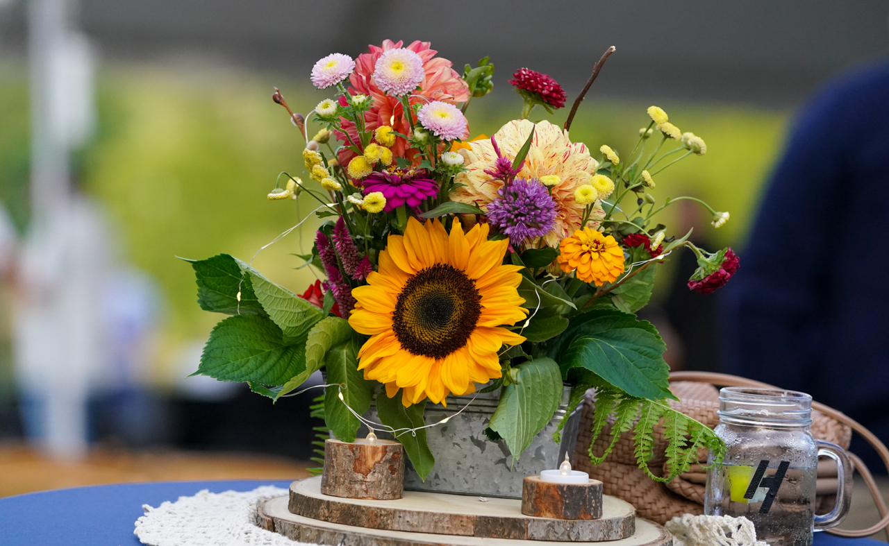 sunflower bouquet by Hendrick Automotive Group-sponsored gazebo at Symphony by the Lake