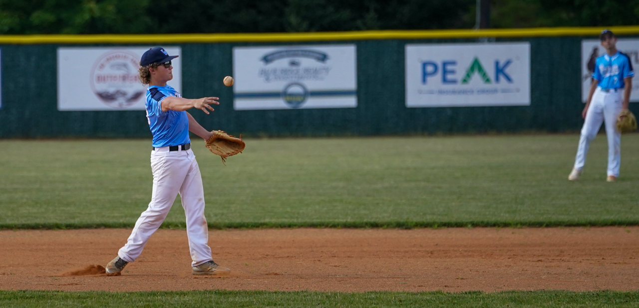 Watauga second baseman Holden Watson throws to first in July 6 game 1 vs. Yancey County