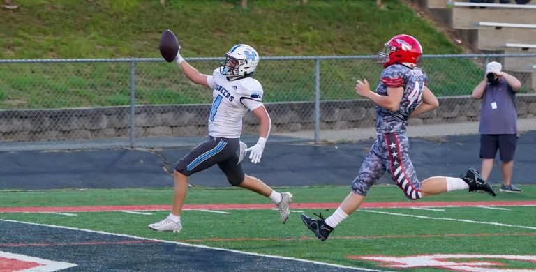 BONUS PHOTOS: Watauga overcomes weather delays to storm past Erwin, 49-14